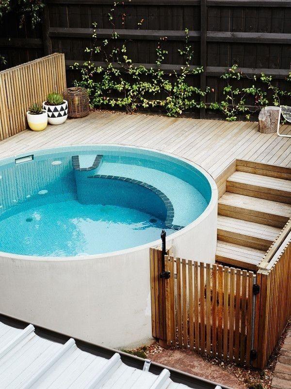 Round Oasis Embraced by Flowing Decking