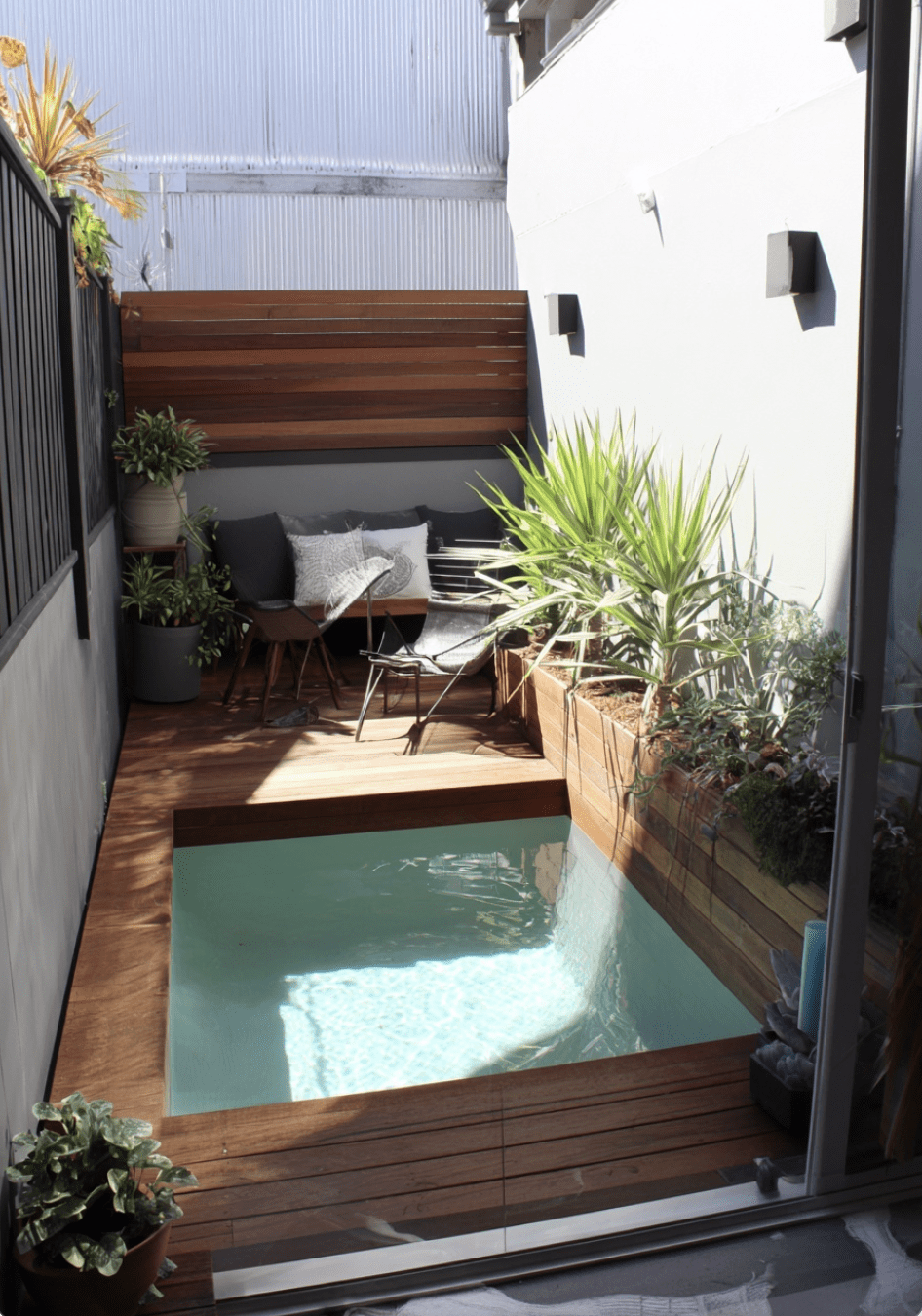 Recessed Compact Pool Featuring Integrated Seating
