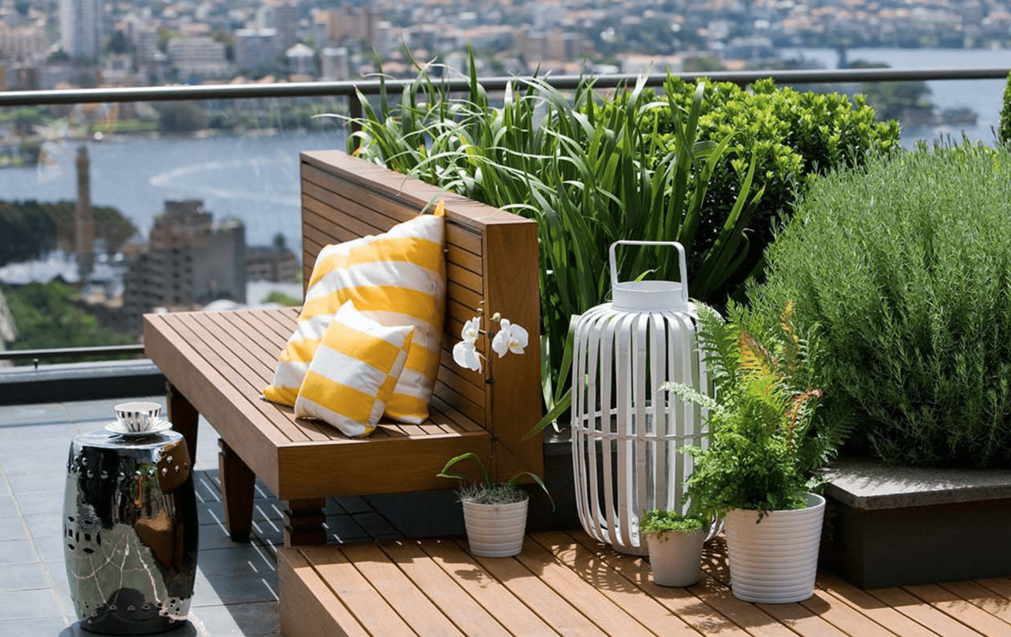 Brighten Your Rooftop Oasis with Vibrant Cushions and Throws