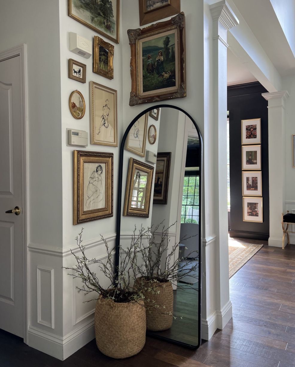 How to Create an Inviting Gallery Wall with a Mirror Focal Point
