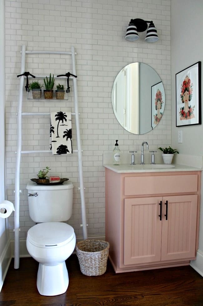 Elevate Your Bathroom Storage with a Ladder Shelf Above the Toilet