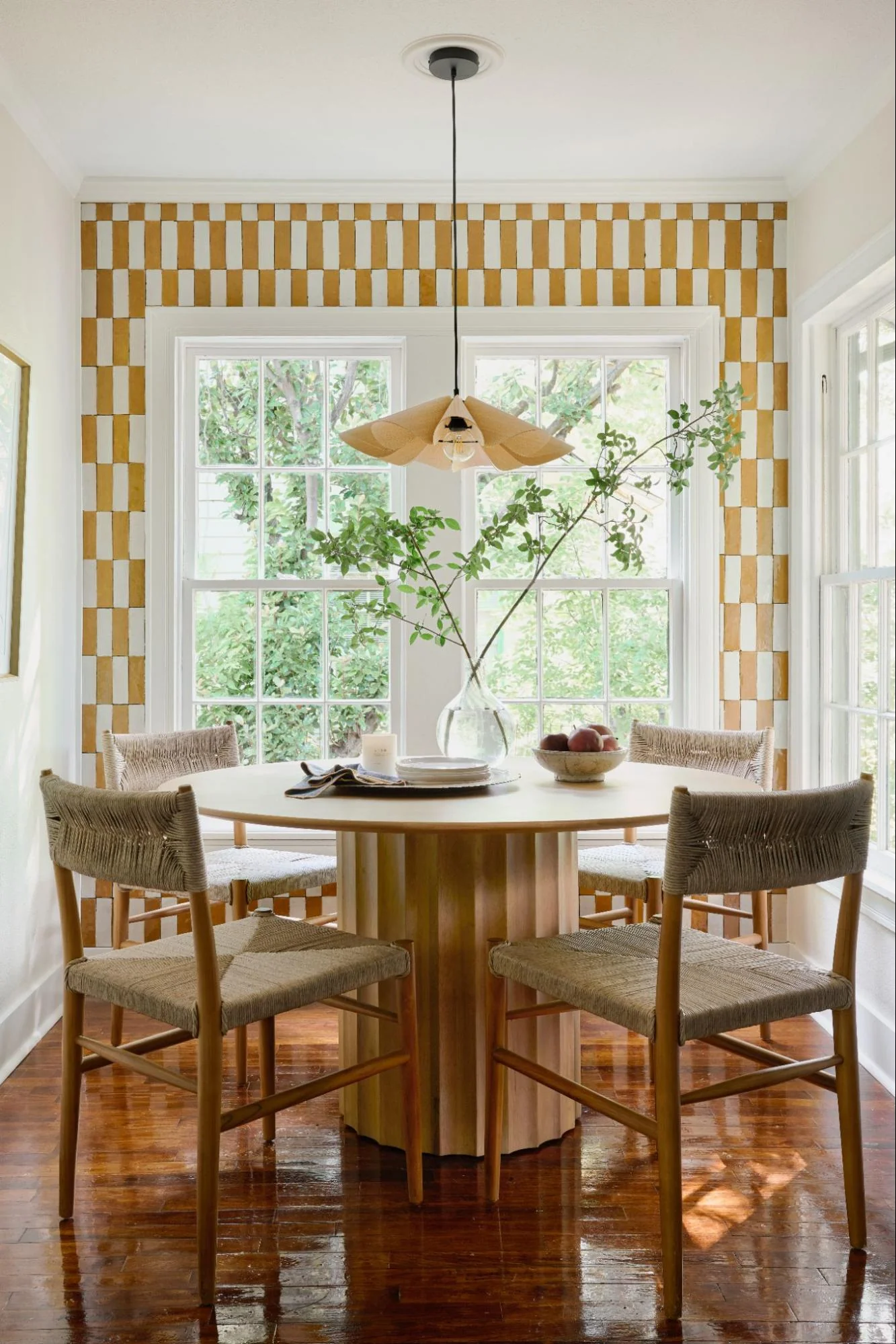 Bright and Inviting Breakfast Nook with Vibrant Drapery