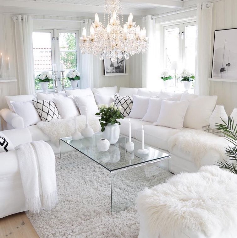 Elegant White Sectional Oasis with Glimmering Crystal and Reflective Accents