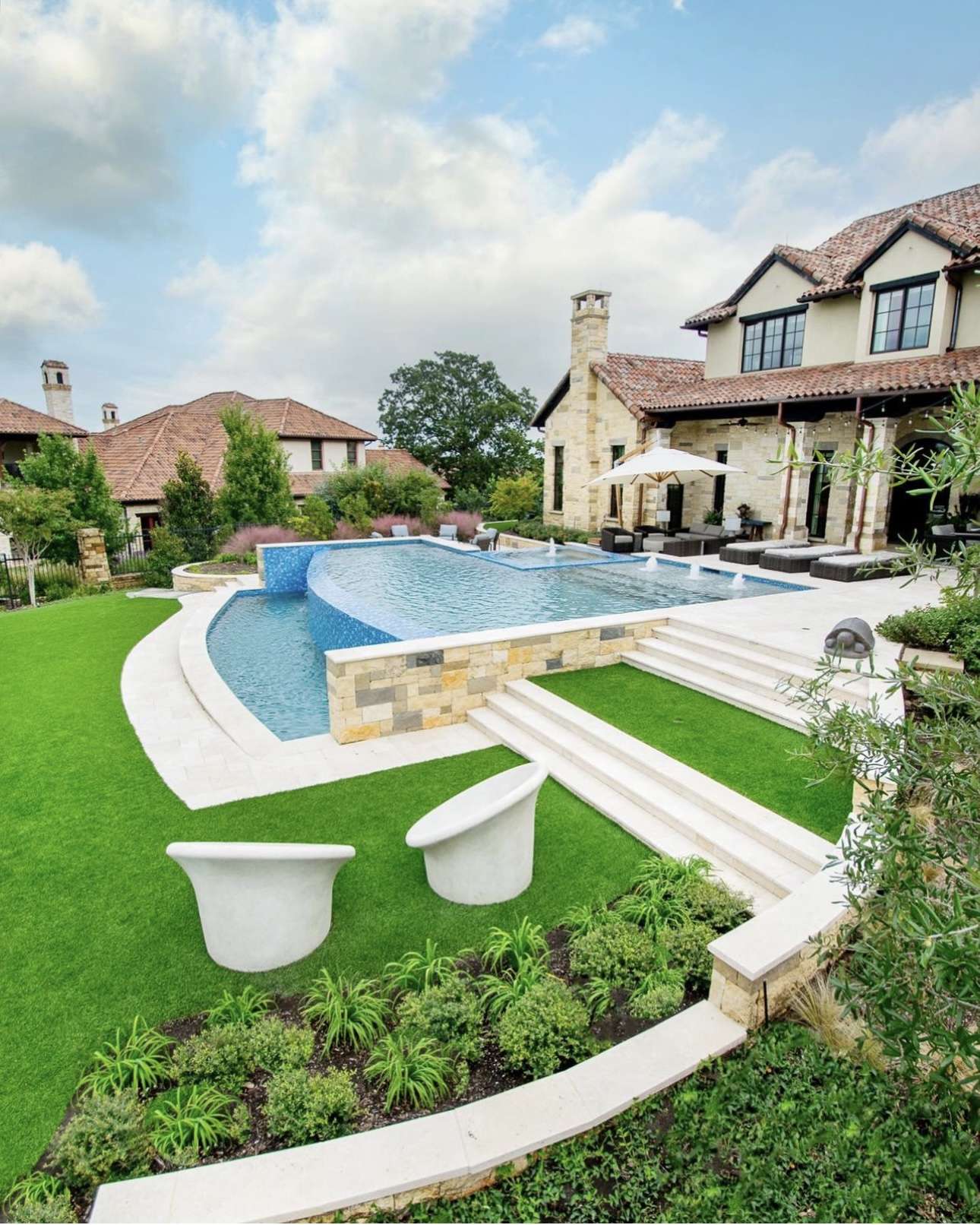Elegant Villa Pool Design Featuring Artificial Turf