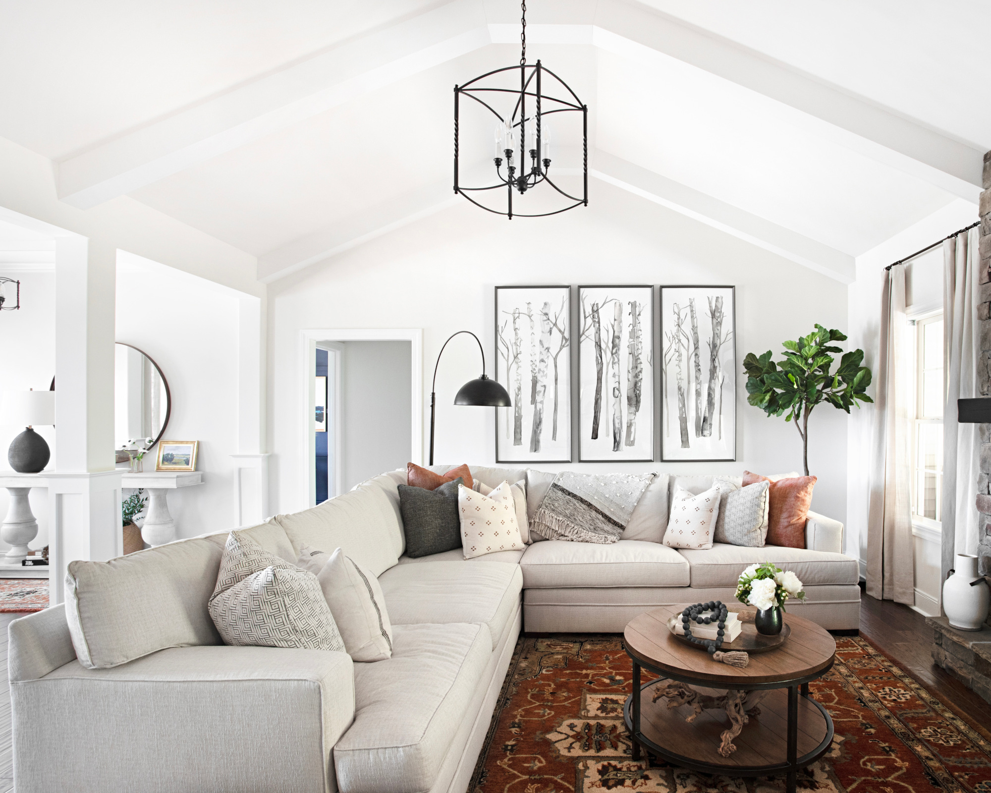 Cozy White Sectional Meets Rustic Timber and Earth-Toned Textiles