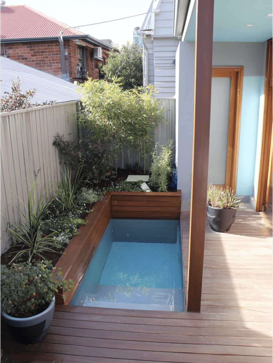 Sleek Slimline Plunge Pool Seamlessly Nestled by the Home