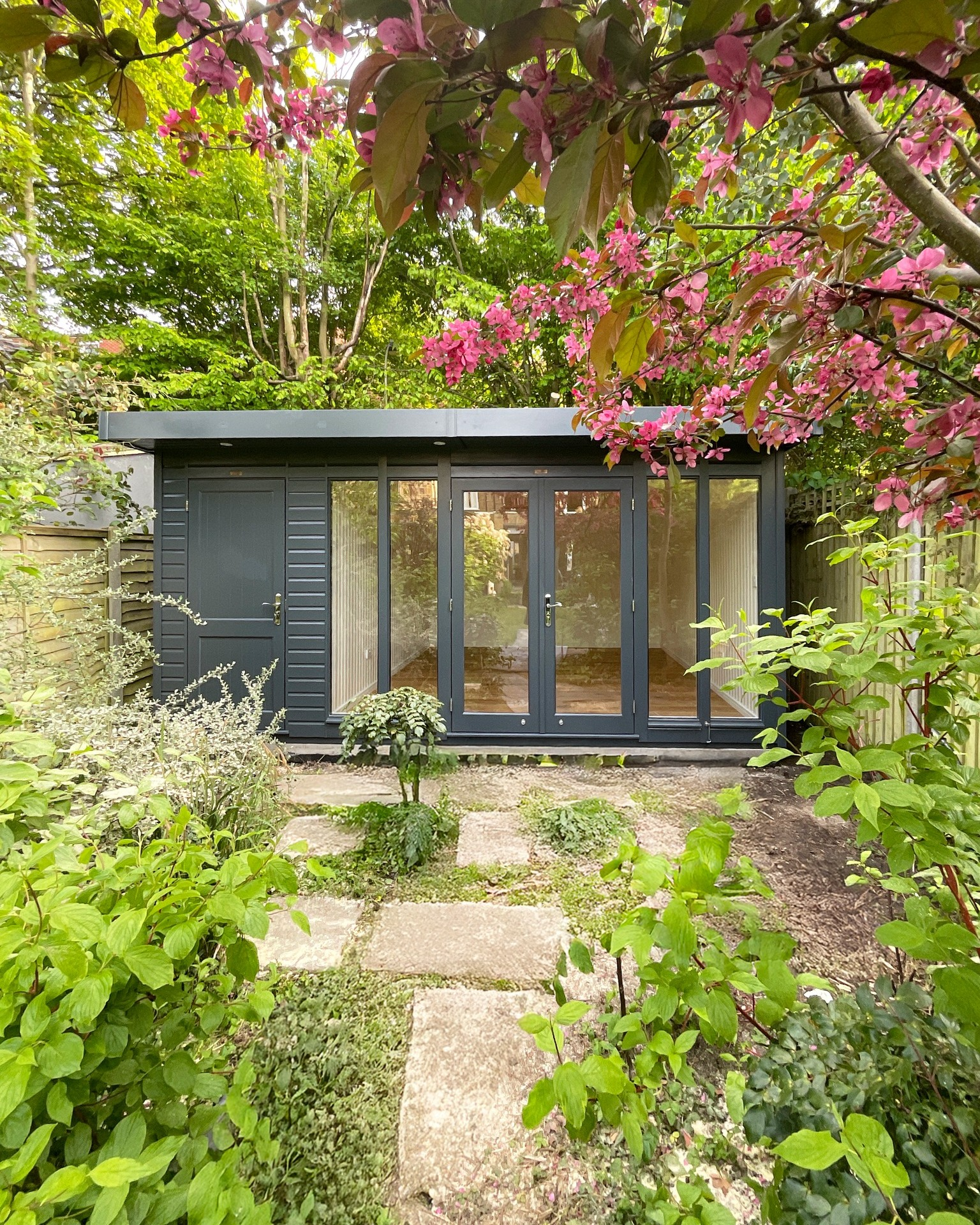 Expansive Glass Panels Paired with Warm Wooden Floors