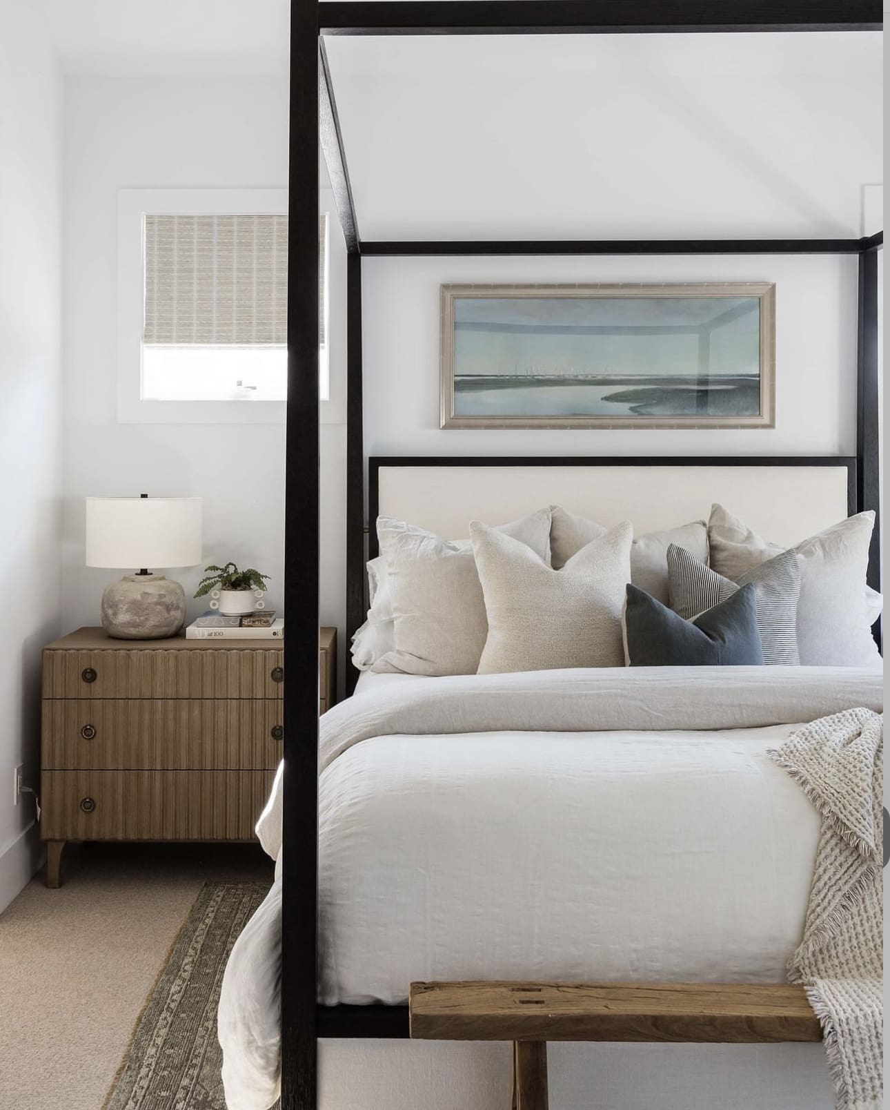 Bold Black Canopy Bed for Coastal Charm