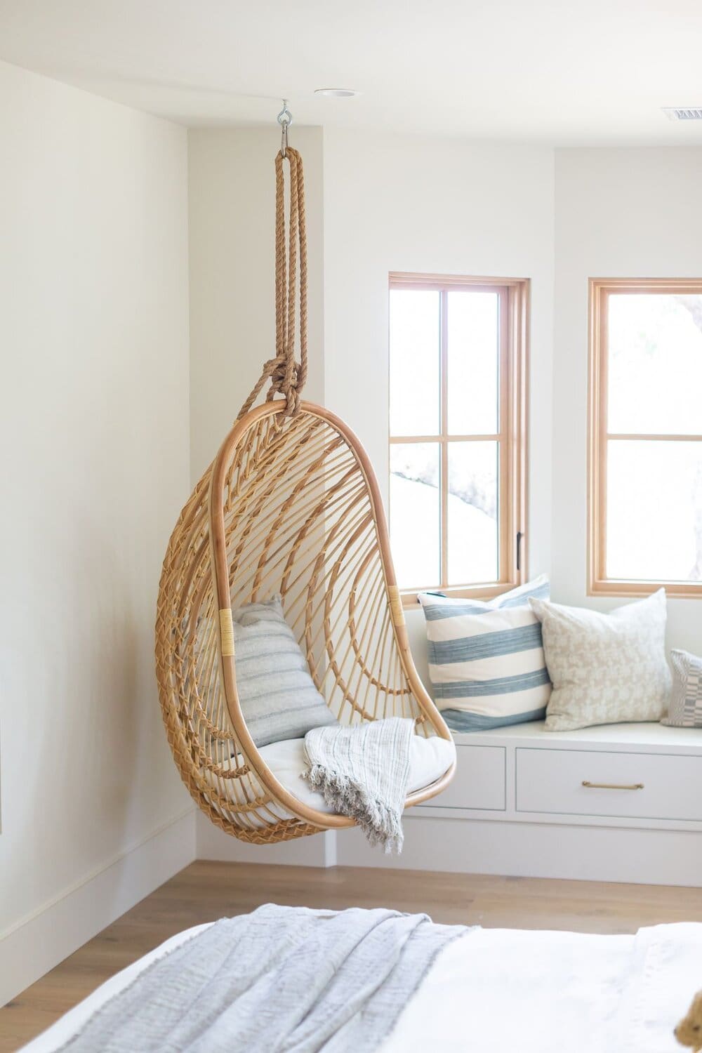 Whimsical Rattan Swing Chair for Playful Kids’ Rooms