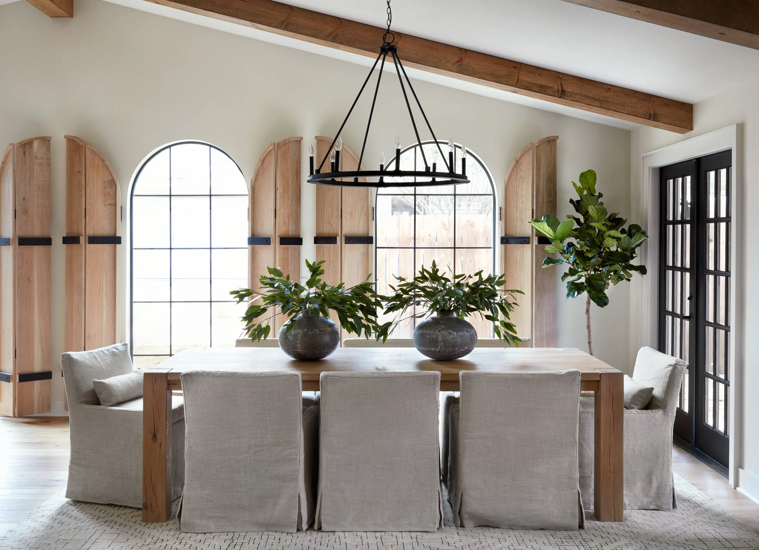 Charming Dining Space with Signature Arched Windows