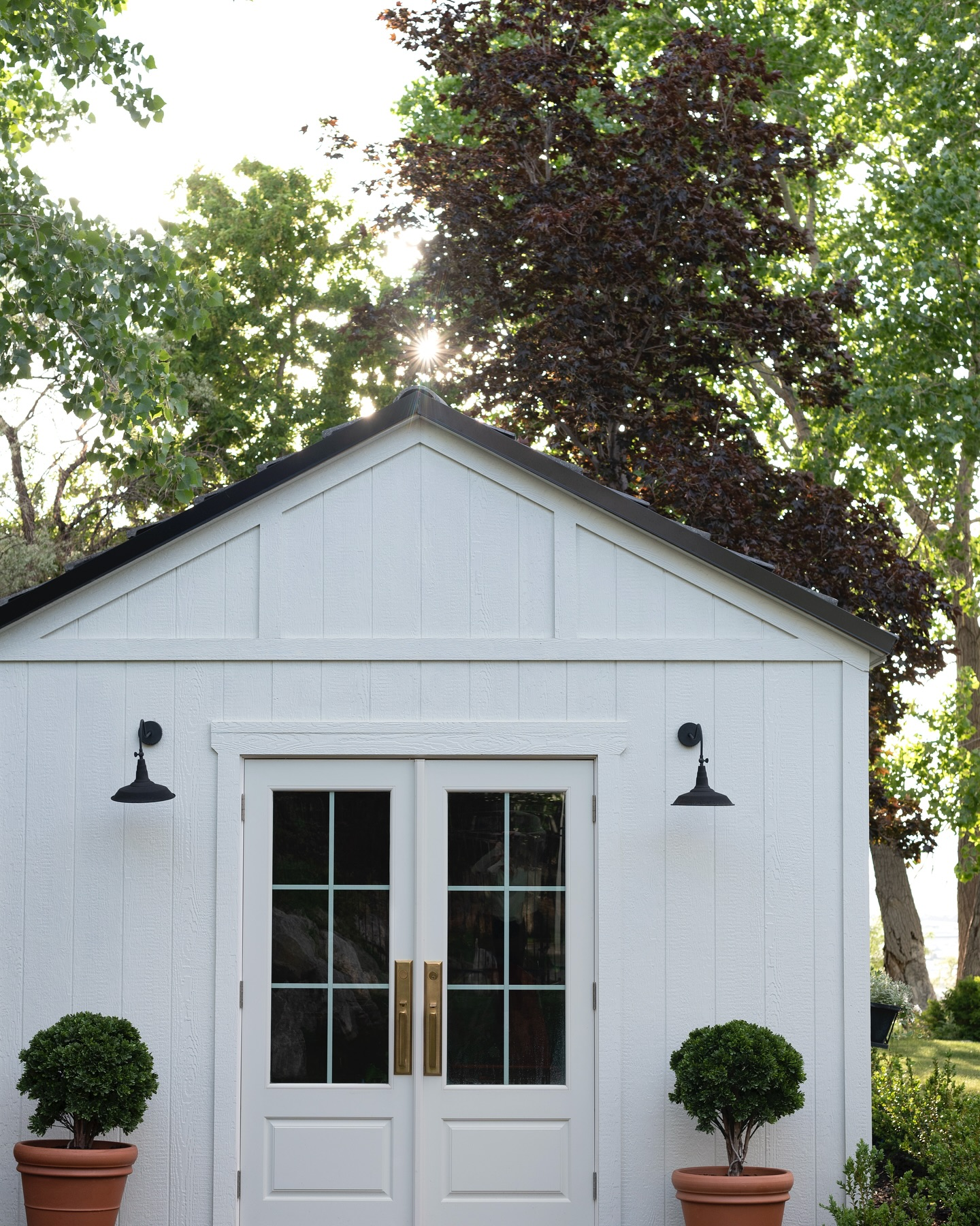 Charming Planters Flanking Your Shed Entrance