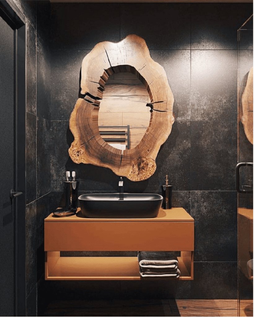 16. Elegant Oval Mirror with Brass Hardware Accents