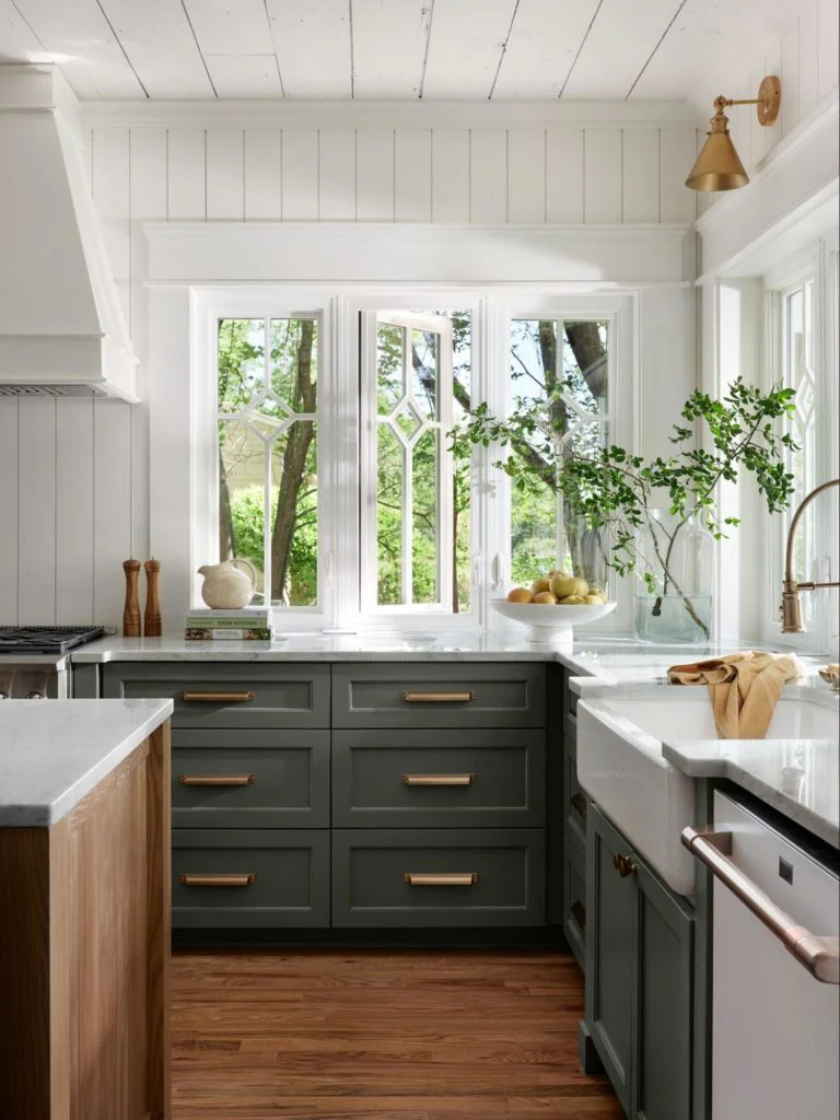 Bright Culinary Space Featuring Rich Emerald Cabinetry