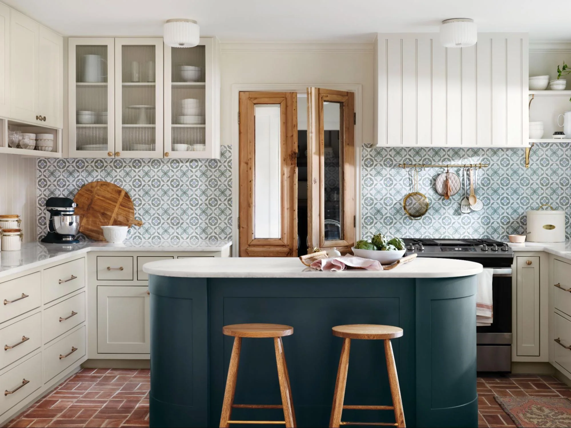Cozy Country Kitchen Featuring a Rounded Center Island