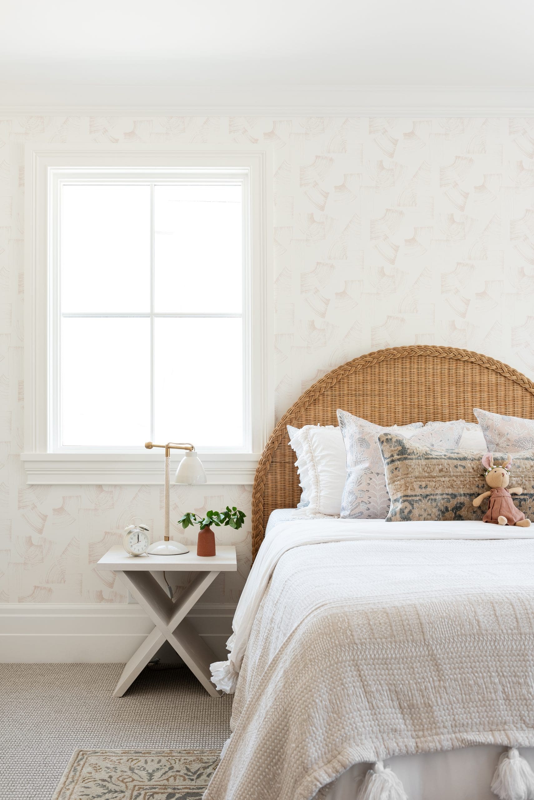 Whimsical Rattan Arch Bed for a Cozy Kids’ Retreat