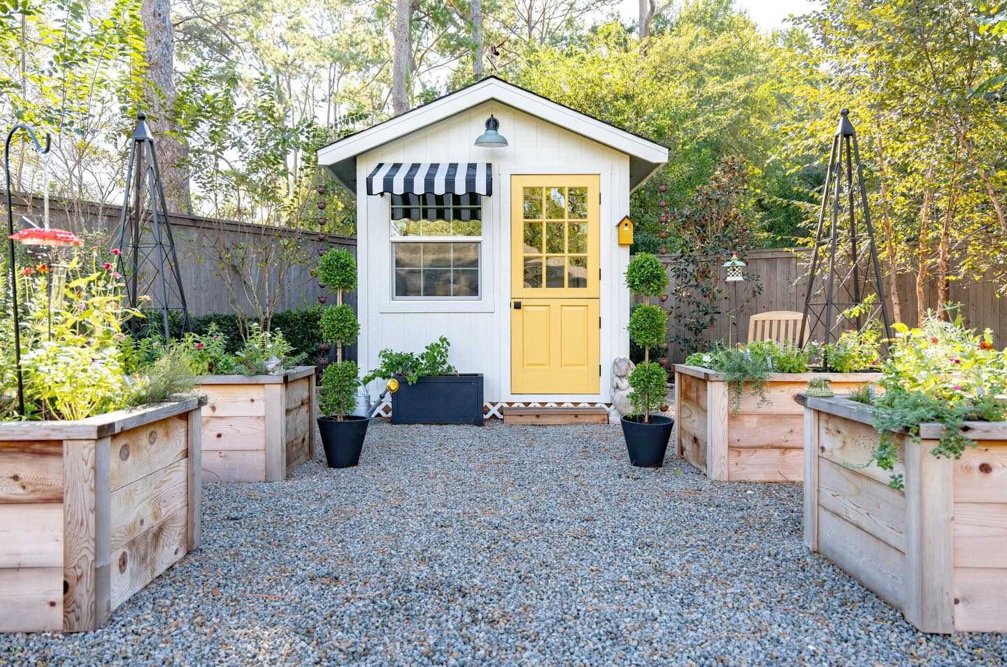 Brighten Up with a Yellow Door on a White Shed