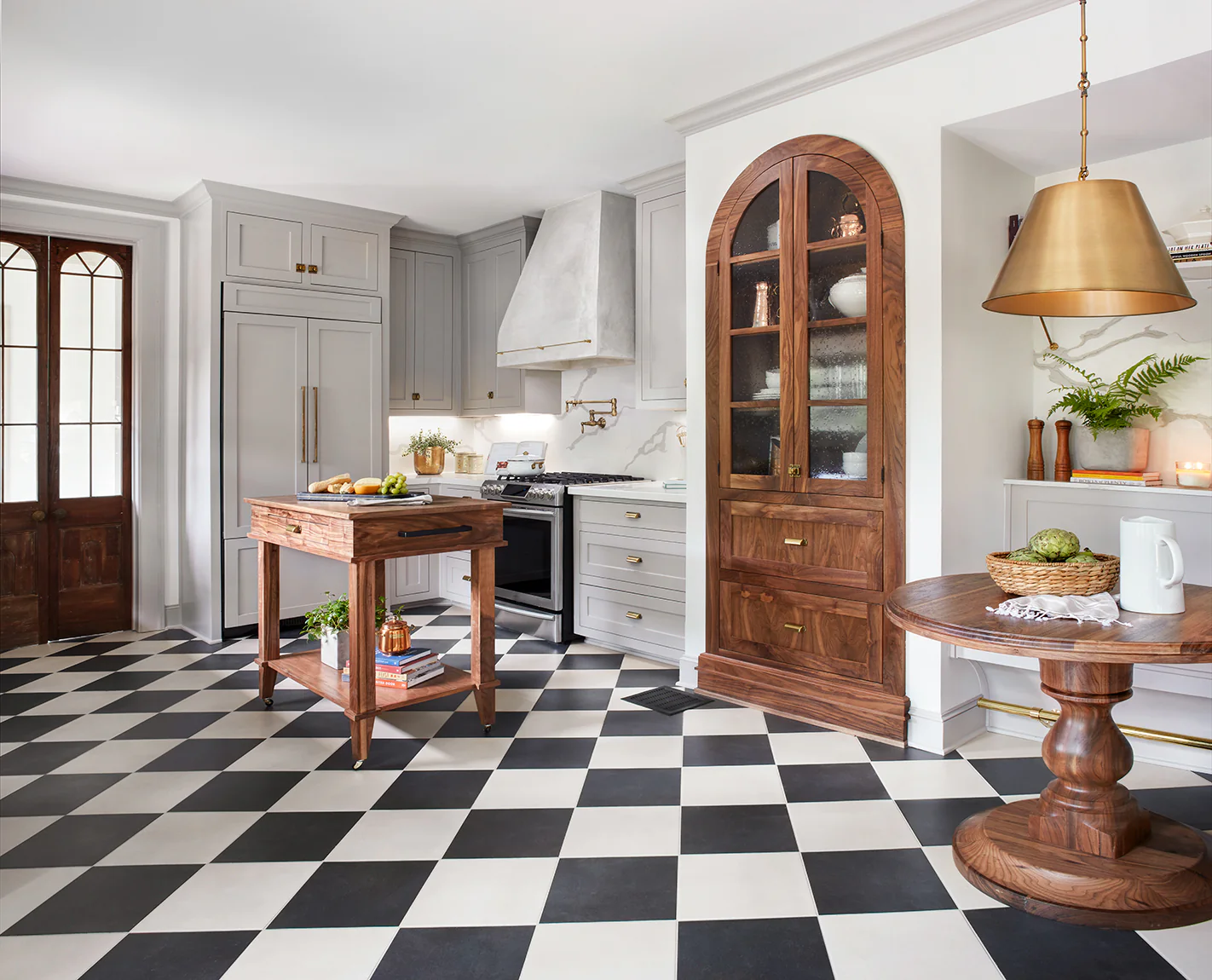 Retro-Inspired Culinary Space Featuring Classic Checkered Flooring